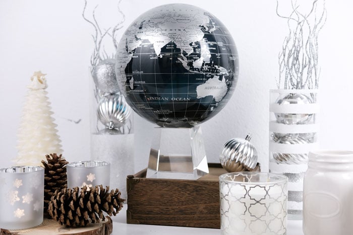 Black and silver MOVA globe with christmas decor