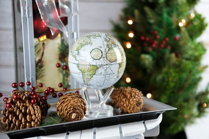 White cassini globe with holiday decor