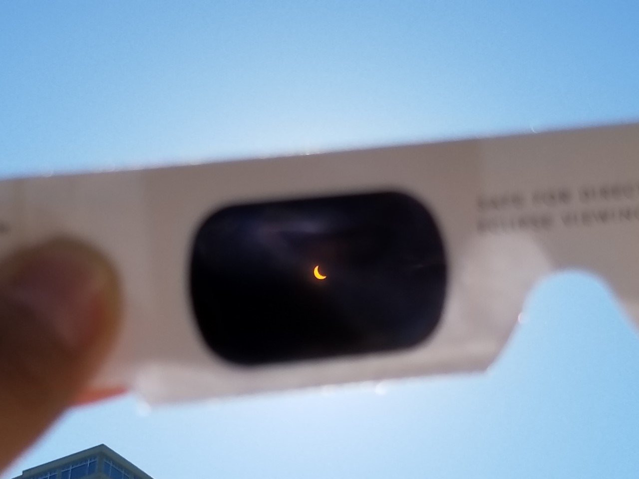 The eclipse through protective glasses