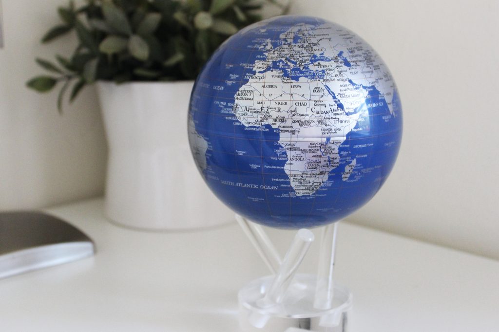 Blue and Silver MOVA Globe on our 3 prong acrylic stand